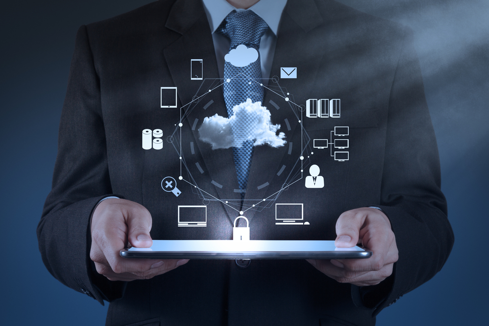 Businessman-hand-working-with-a-Cloud-Computing-diagram-on-the-new-computer-interface-as-concept-1
