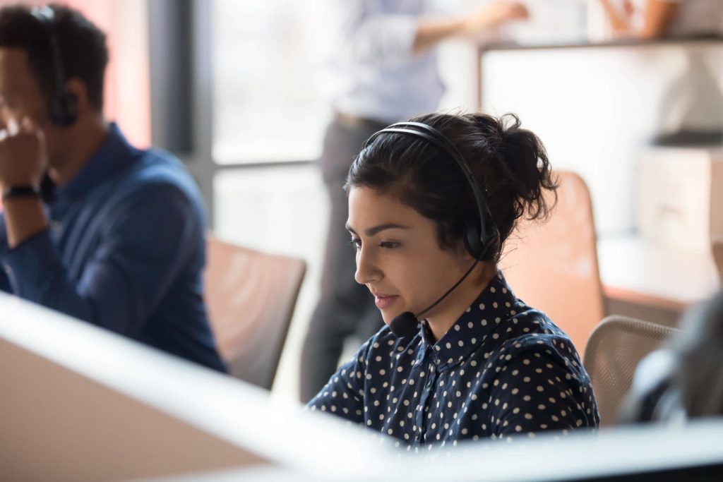 Employee-helping-a-customer-on-the-phone-1-1024x683